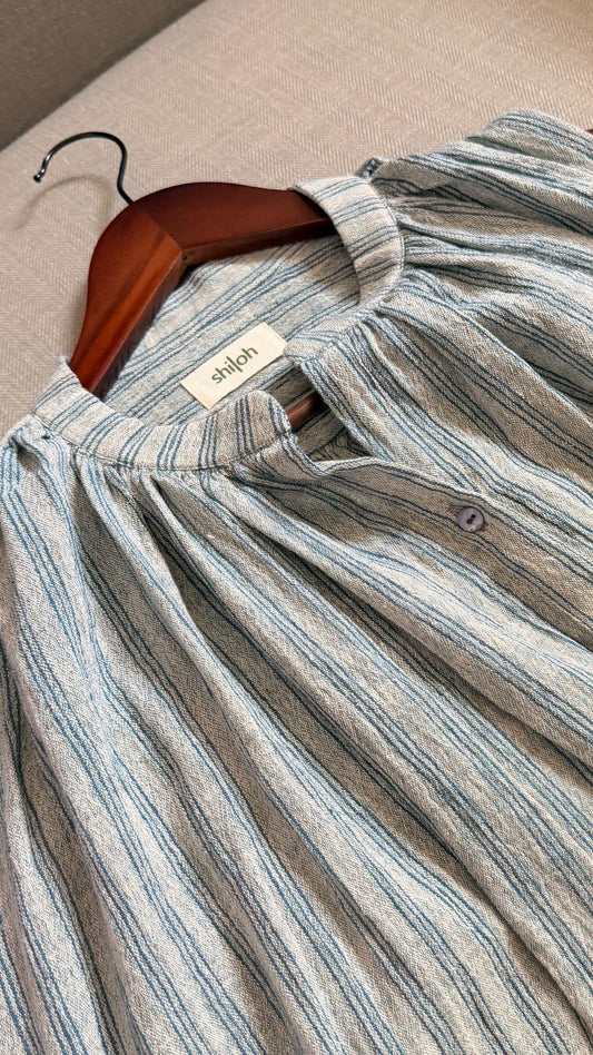 Sleeveless handwoven cotton striped top in blue with button-down front.