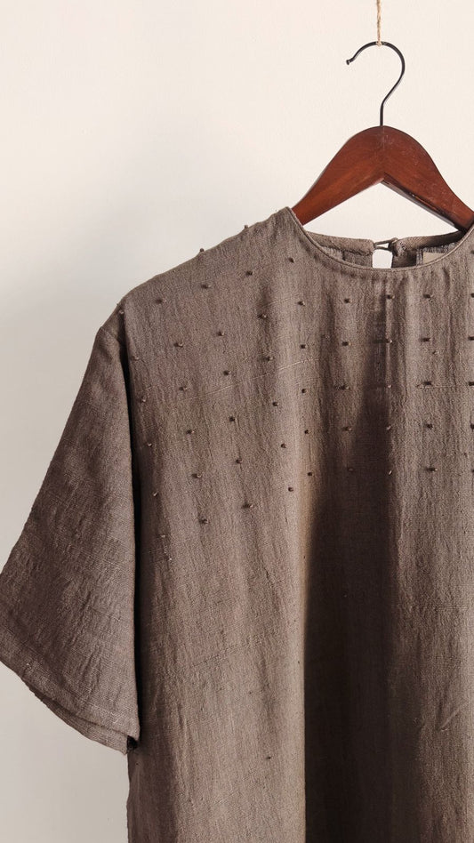 Dark grey relaxed-fit khadi cotton dress with hand-done French knot detailing on the yoke
