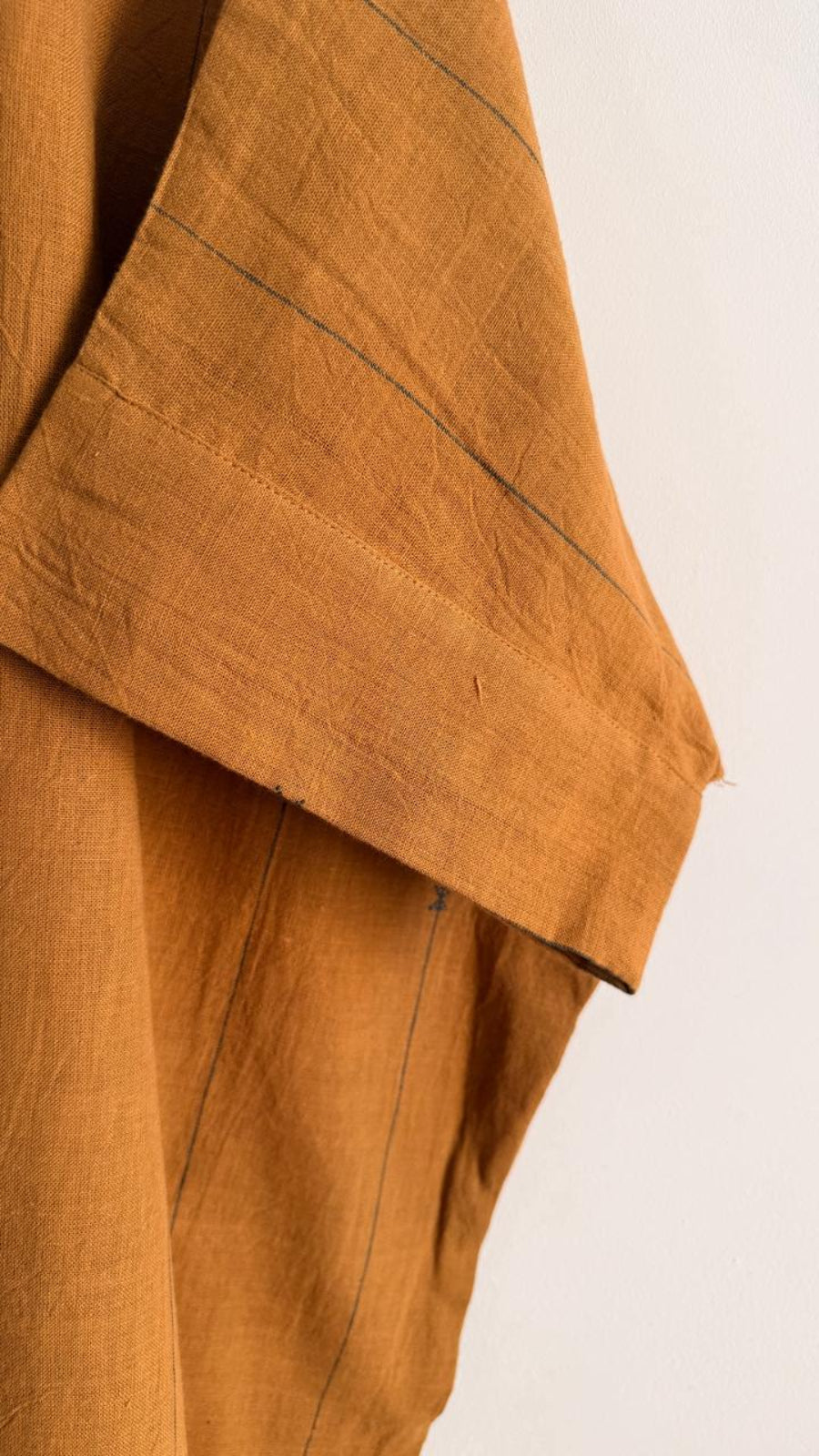 Sleeve detail of handwoven cotton dress with clean seam finish