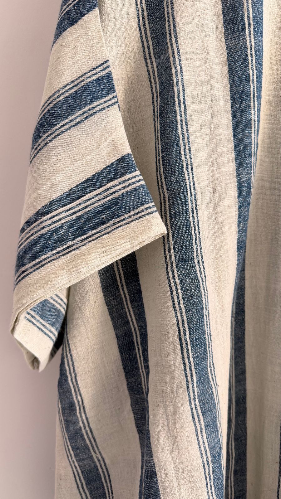 Sleeve detail of Cedar dress in oat indigo handwoven cotton.