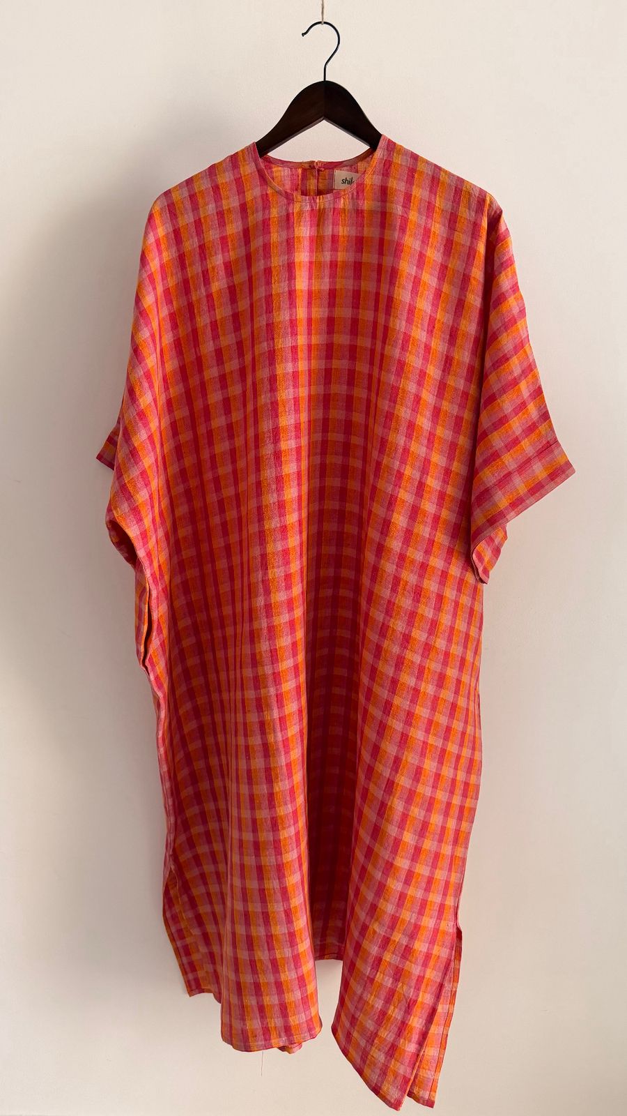 Sycamore dress in Berry Sunset – relaxed handwoven linen check dress in pink and orange tones.
