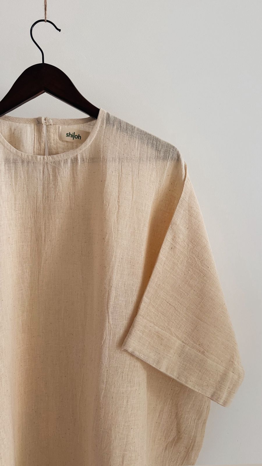 Cedar dress in Greige – round neckline and sleeve detail in handwoven cotton.