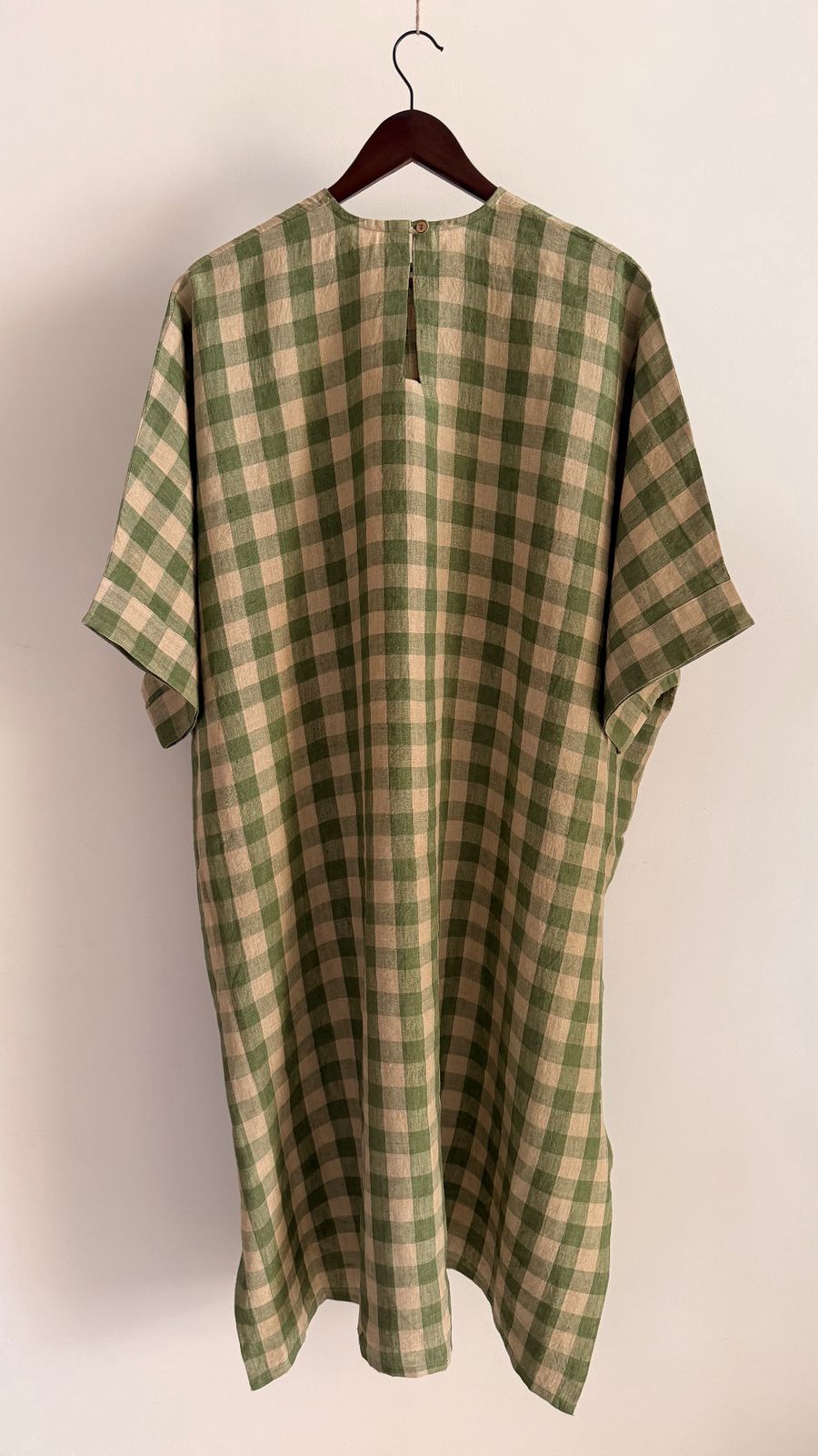 Sycamore dress in Sage Stone – back view of relaxed handwoven linen check dress with wide sleeves.