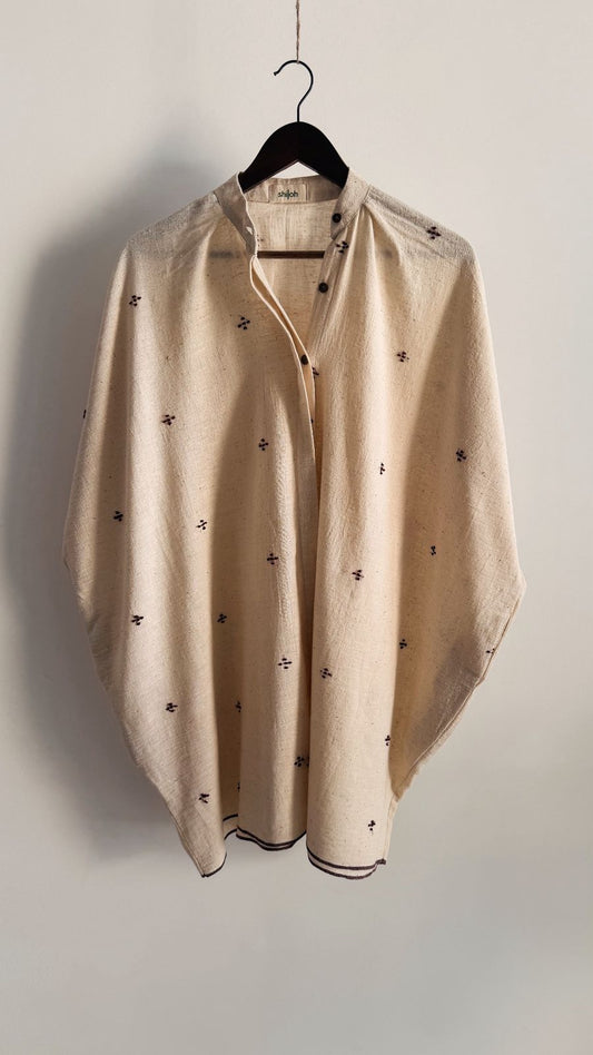 Handwoven cotton short dress with button-down front and relaxed fit.