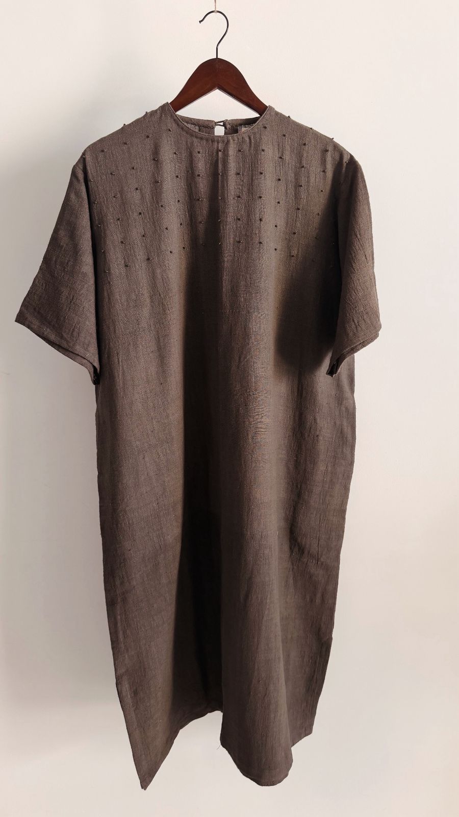 Dark grey relaxed-fit khadi cotton dress with hand-done French knot detailing on the yoke